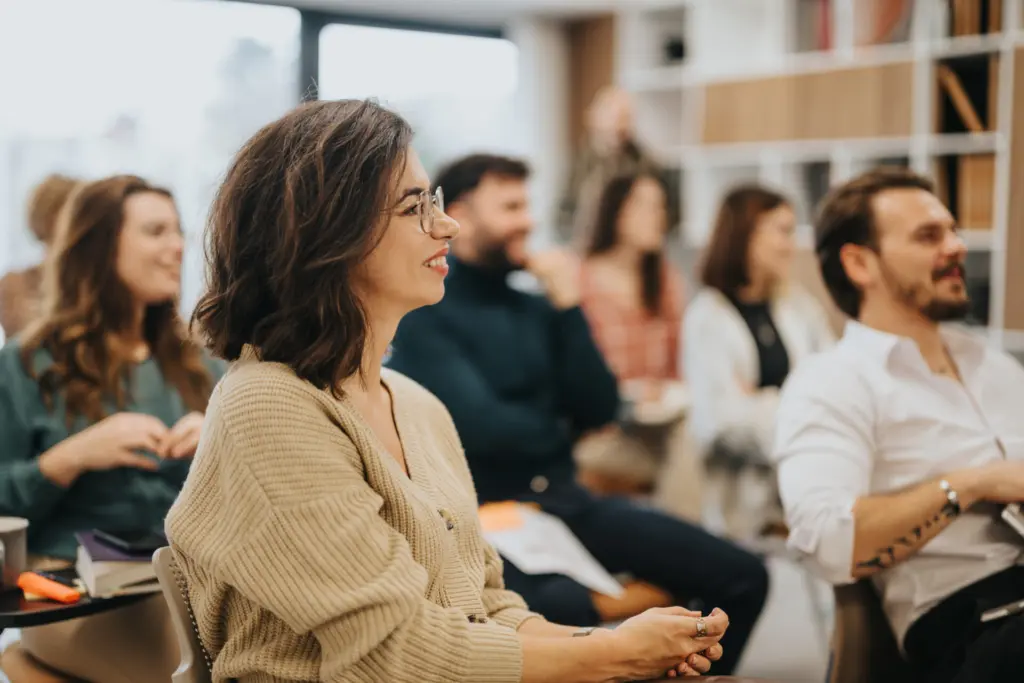 Woman smiling during Community Engagement event
